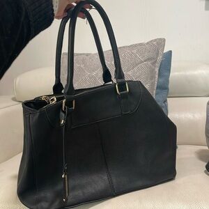 Mistique vegan leather  black bag.